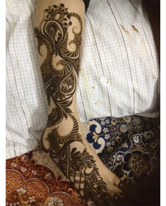 Peacock Inspired Curvy Arabic Mehndi Design