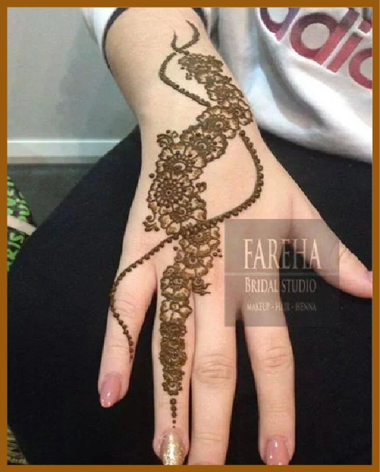 Khafif back hand mehndi design with bead detailing