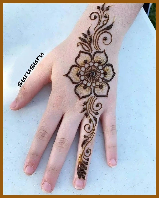 Khafif back hand mehndi with Arabic-inspired layout