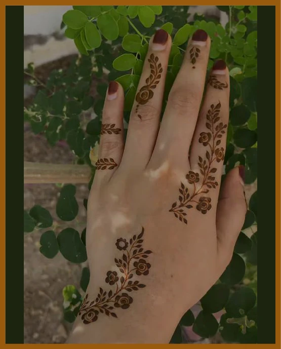Khafif back hand mehndi with shaded floral chain