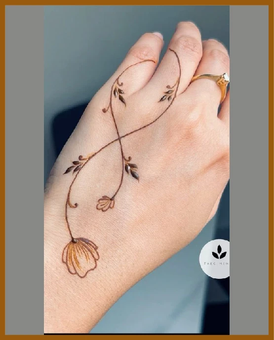Rose-based khafif back hand design with curves Khafif%20(Minimal)%20back%20hand Mehndi Design