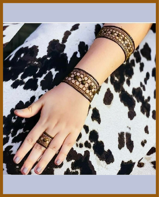 Basic circular wrists bands in simple back hand mehndi Basic circular wrists bands in simple back hand mehndi