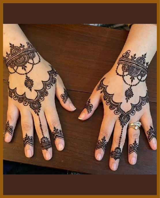 Crown filled design in simple back hand mehndi art Crown filled design in simple back hand mehndi art