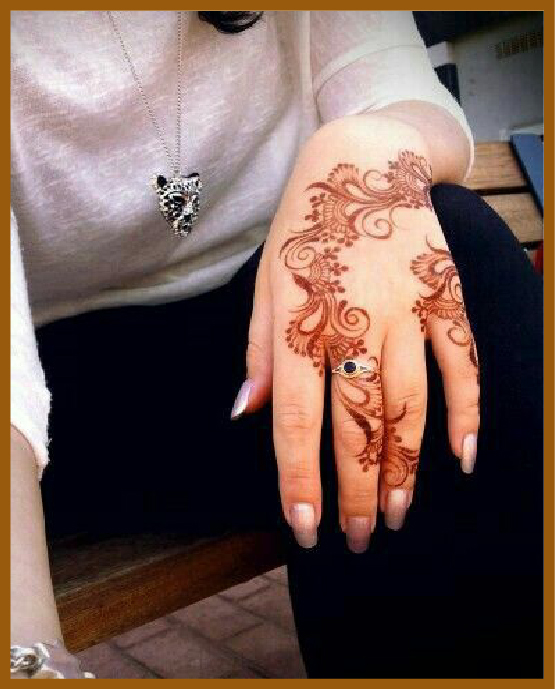 Leaf chain accents in simple back hand mehndi design Leaf chain accents in simple back hand mehndi design