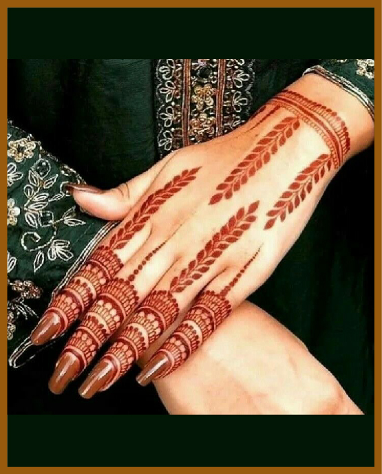 Minimal chains of leaves in simple back hand mehndi style Minimal chains of leaves in simple back hand mehndi style