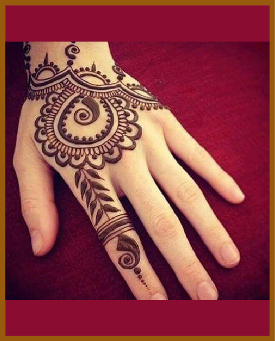 Neatly aligned elements in simple back hand mehndi net Neatly aligned elements in simple back hand mehndi net