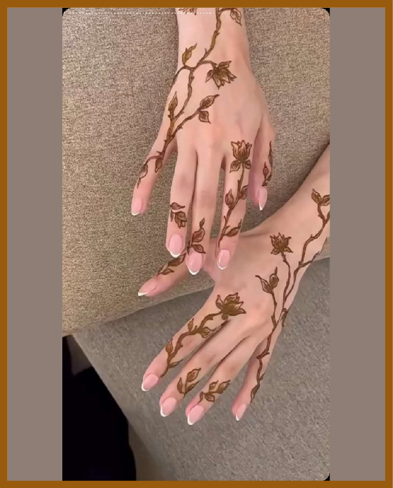 Net with floral border in simple back hand mehndi Net with floral border in simple back hand mehndi