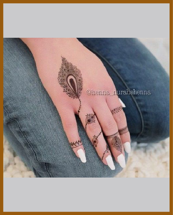 Simple back hand mehndi peacock fine net art Simple back hand mehndi peacock fine net art