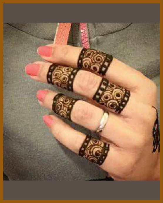 Simple back hand mehndi ring shaded fingers Simple back hand mehndi ring shaded fingers