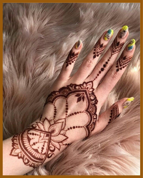 Simple back hand mehndi with wrist band netting Simple back hand mehndi with wrist band netting