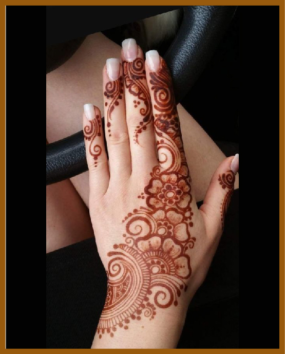 Structured net pattern in simple back hand mehndi Structured net pattern in simple back hand mehndi