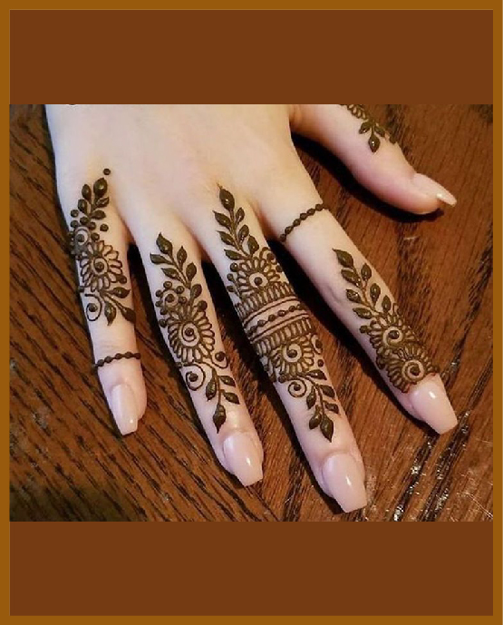 Stylish finger net in simple back hand mehndi design Stylish finger net in simple back hand mehndi design