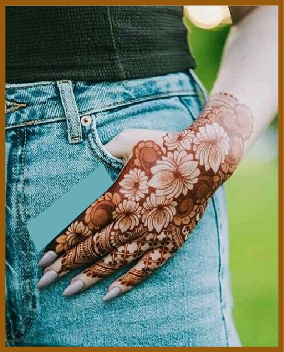 Flower creeper on stylish back hand mehndi design trail Flower creeper on stylish back hand mehndi design trail