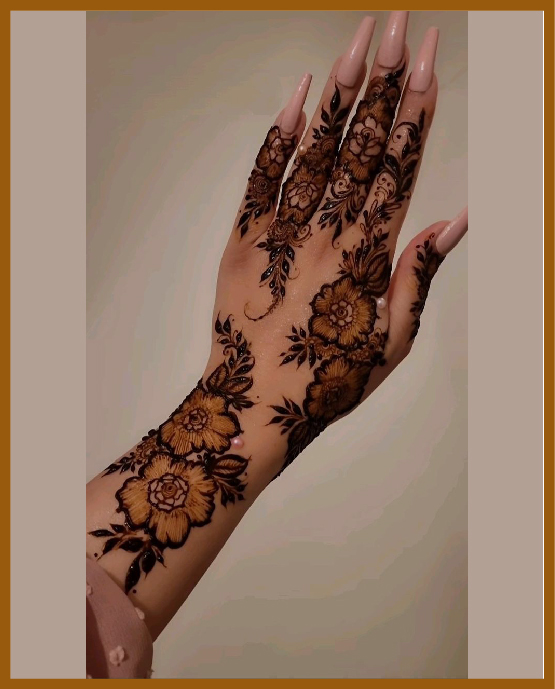 Stylish back hand chain mehndi designs with florals Stylish back hand chain mehndi designs with florals