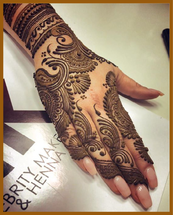 Stylish back hand mehndi chain links and trail art Stylish back hand mehndi chain links and trail art
