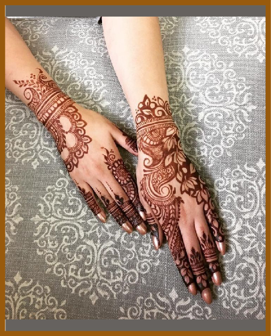 Stylish back hand mehndi design inspired by Arabic art Stylish back hand mehndi design inspired by Arabic art