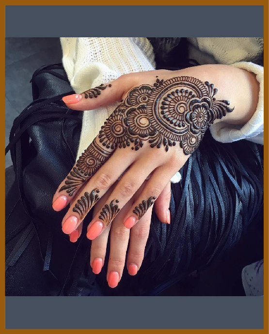 Stylish back hand modern twist mehndi design with classic touch Stylish back hand modern twist mehndi design with classic touch