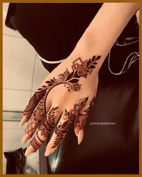 Aesthetic Petal-styled back hand mehndi design Aesthetic Petal-styled back hand mehndi design