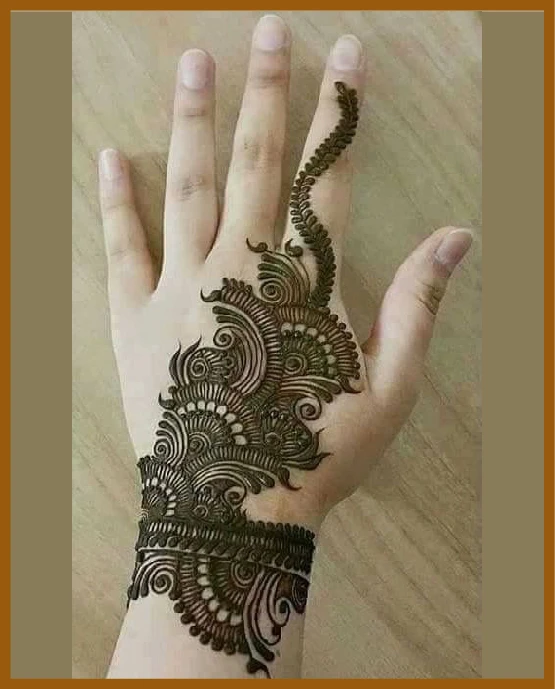 Aesthetic back hand lace mehndi for festive occasions Aesthetic back hand lace mehndi for festive occasions