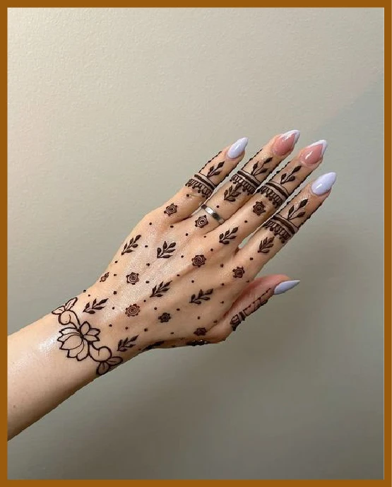 Aesthetic back hand leaves mehndi design Aesthetic back hand leaves mehndi design