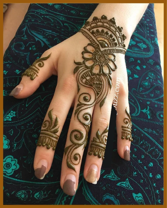 Aesthetic back hand mehndi with bracelet style design Aesthetic back hand mehndi with bracelet style design