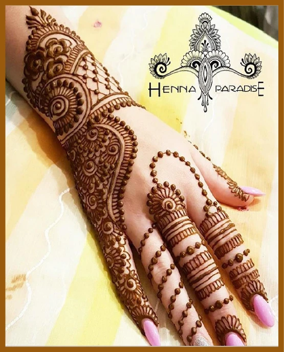 Aesthetic back hand mehndi with dotted lines partial filling Aesthetic back hand mehndi with dotted lines partial filling