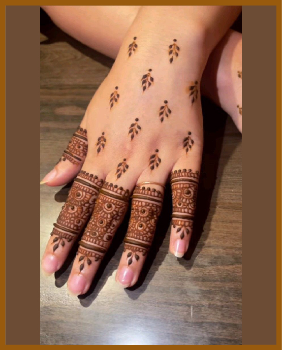 Artistic geometric shapes back hand mehndi Artistic geometric shapes back hand mehndi