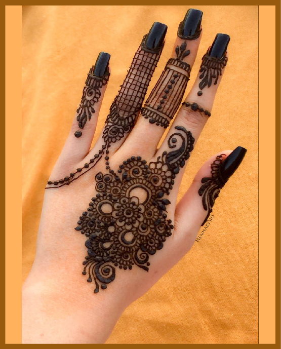 Contemporary aesthetic back hand mehndi with finger tips art Contemporary aesthetic back hand mehndi with finger tips art
