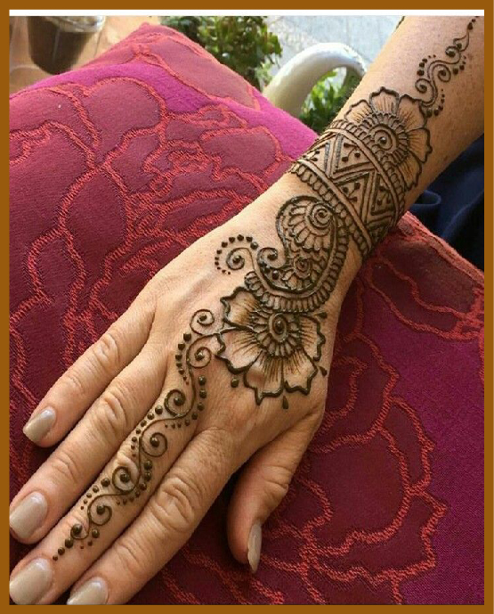 Light lace-style asethetic back hand mehndi for girls Light lace-style asethetic back hand mehndi for girls