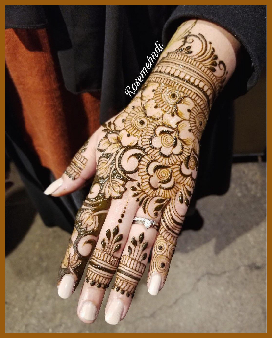 Mehndi with shaded roses in aesthetic layout Mehndi with shaded roses in aesthetic layout