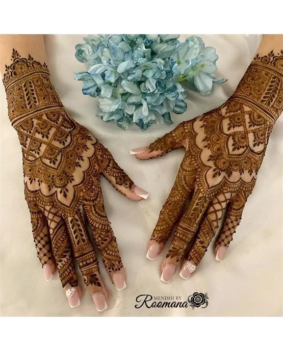 Glamorous Crescent With Bloom Featuring Back Hand Mehndi Design Glamorous Crescent With Bloom Featuring Back Hand Mehndi Design