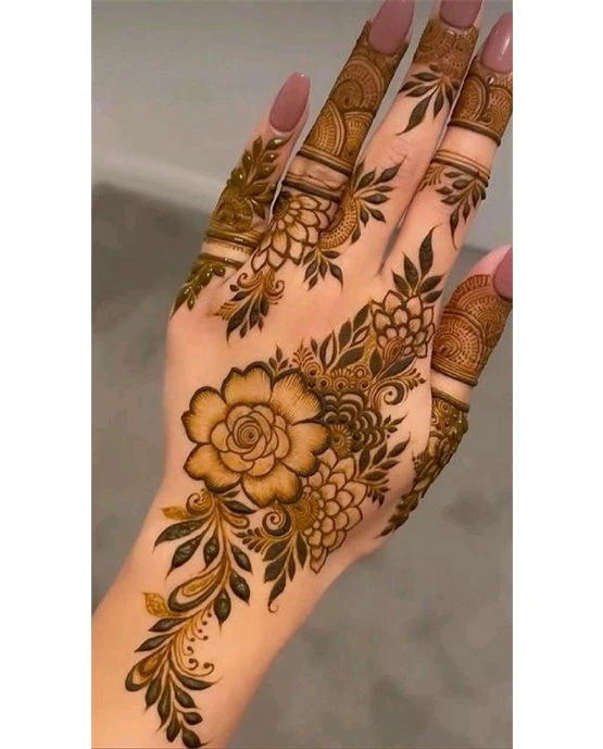 Graceful Cascade And Tile Along Back Hand Mehndi Design Graceful Cascade And Tile Along Back Hand Mehndi Design