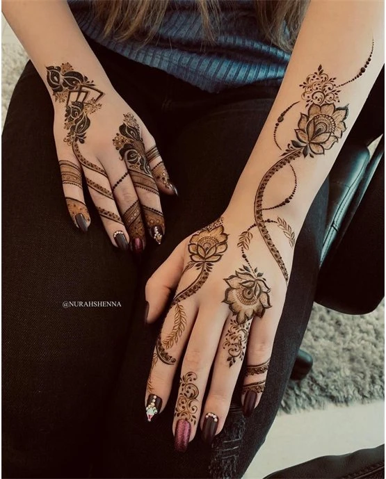 Jasmine Ribbon Detailing Blending Into Back Hand Mehndi Design Jasmine Ribbon Detailing Blending Into Back Hand Mehndi Design