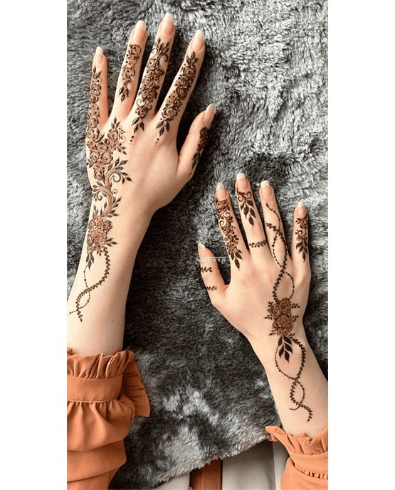 Light Feather And Star Along Back Hand Mehndi Design Light Feather And Star Along Back Hand Mehndi Design