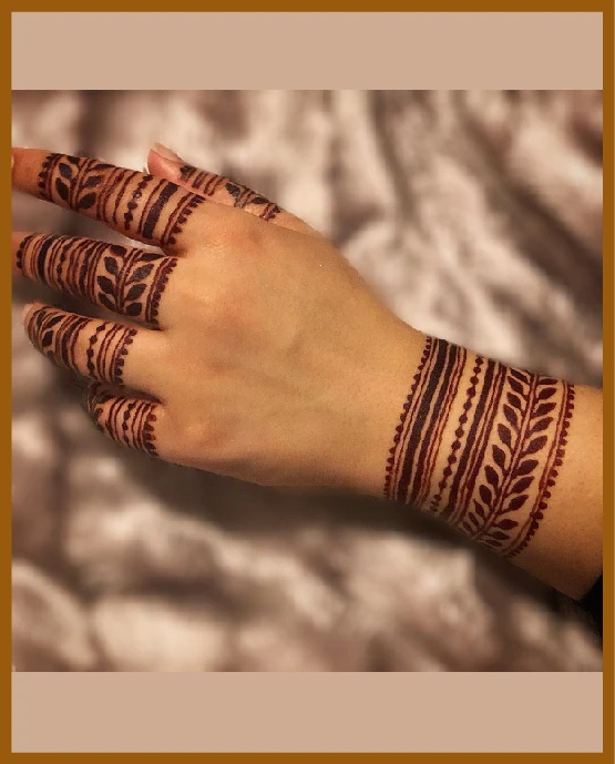Back hand flower line band modern mehndi design Back hand flower line band modern mehndi design