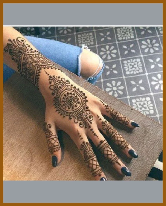 Bold dot line chain in modern back hand mehndi design Bold dot line chain in modern back hand mehndi design