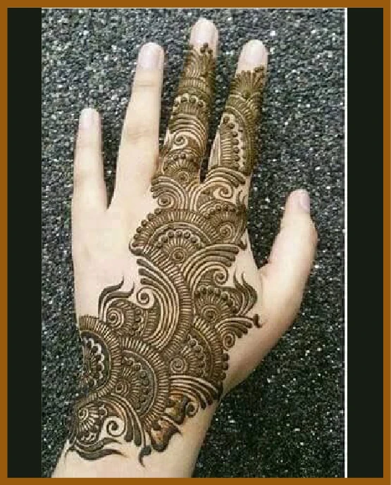 Bold loop bracelet in modern back hand mehndi design Bold loop bracelet in modern back hand mehndi design