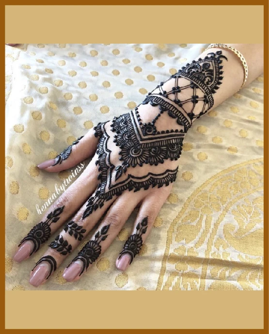 Bracelet net links in modern back hand mehndi design Bracelet net links in modern back hand mehndi design