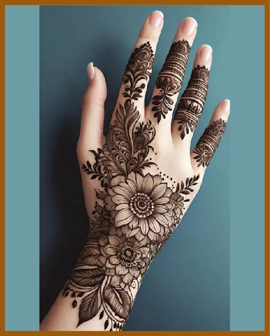 Detailed vines and lines in modern back hand mehndi design Detailed vines and lines in modern back hand mehndi design
