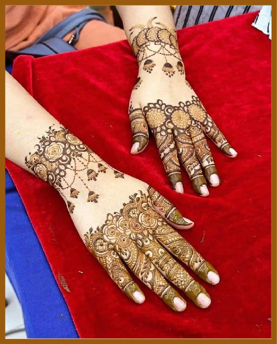 Flower geometric pattern in modern back hand mehndi design Flower geometric pattern in modern back hand mehndi design