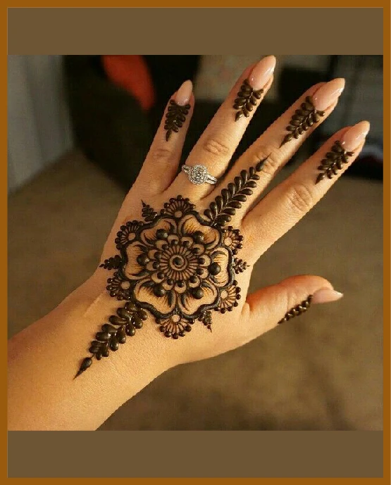 Linked mandala and line in modern back hand mehndi design Linked mandala and line in modern back hand mehndi design