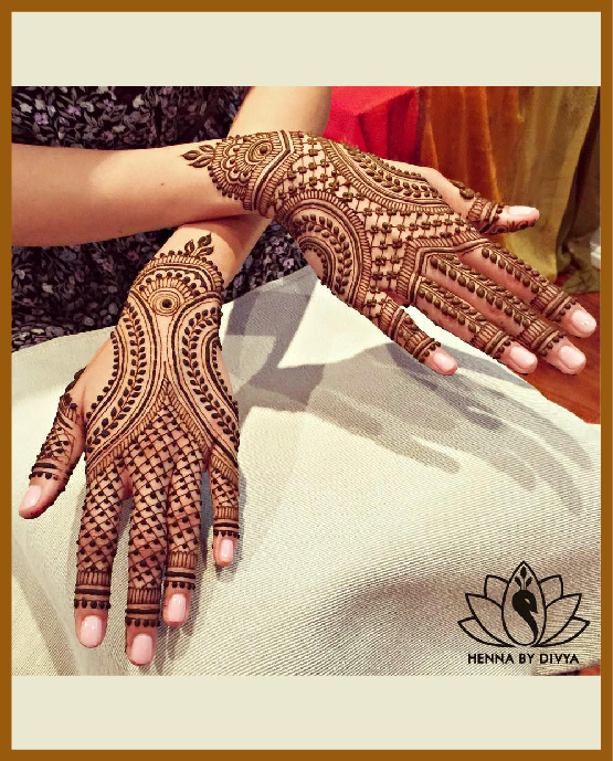 Overlapping lines and chains in modern back hand mehndi design Overlapping lines and chains in modern back hand mehndi design