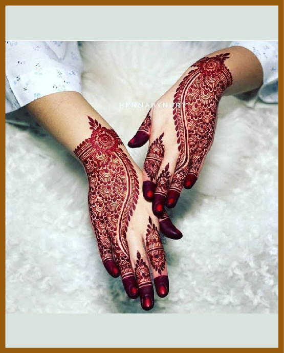 Structured loops and curves for modern back hand mehndi design Structured loops and curves for modern back hand mehndi design