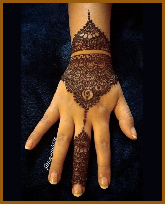 Trendy wrist loop modern back hand mehndi design Trendy wrist loop modern back hand mehndi design