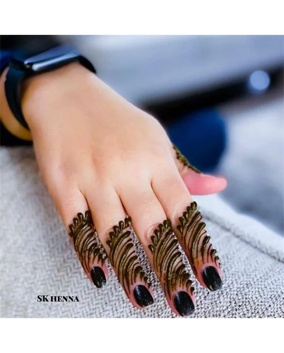 Creative Blend And Butterfly Featuring Ring Finger Mehndi Design