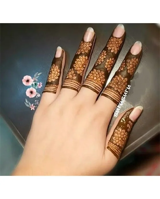 Stunning Overlay Touch Blending Into Ring Finger Mehndi Design