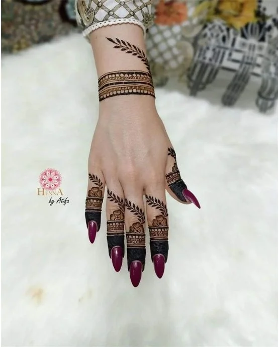 Ethnic Motif Using Plait Royal Finger Mehndi Design