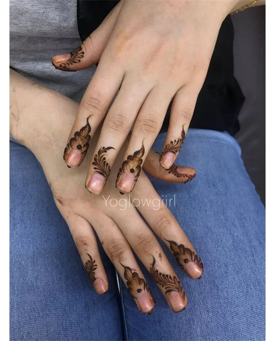 Unique Hook Art Blending Into Simple Finger Mehndi Design