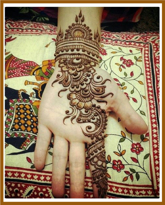 Finger ring illusion in aesthetic front hand mehndi design Finger ring illusion in aesthetic front hand mehndi design