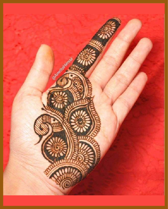 Fingertip floral chain in minimal front hand mehndi design Fingertip floral chain in minimal front hand mehndi design